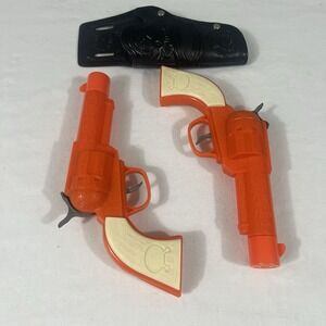 2009 IMPERIAL TOYS ORANGE & WHITE REVOLVERS TOY CAP GUN LEGENDS OF THE WILD WEST